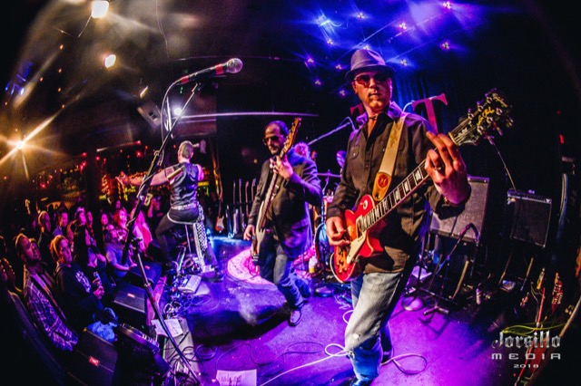 Jeff Hardwick on guitar with the band